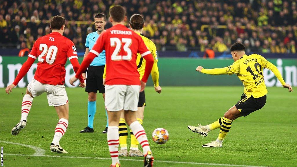 Jadon Sancho scores for Borussia Dortmund against PSV Eindhoven in the Champions League