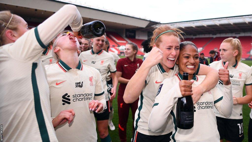 Rachel Furness celebrates winning the title with Liverpool last year