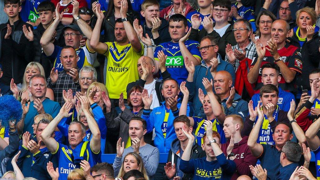 Warrington fans show their appreciation at the Halliwell Jones