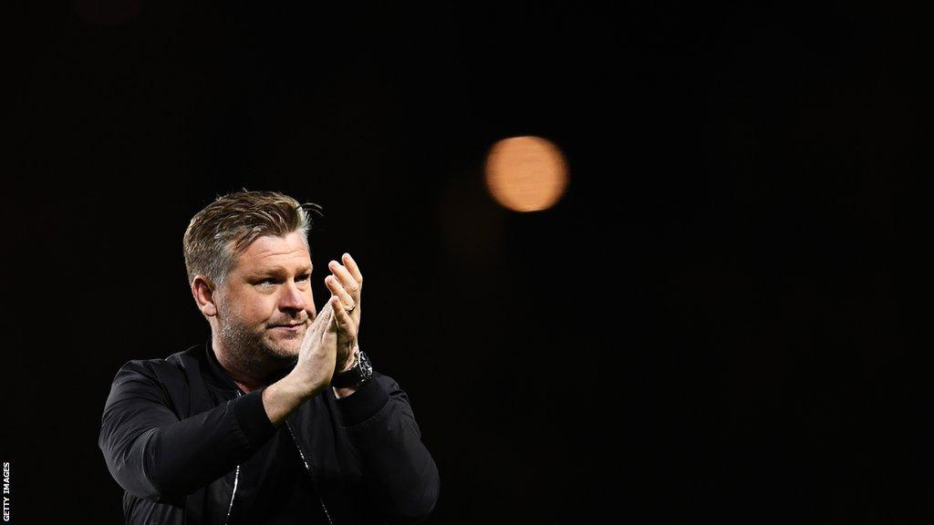 Who will take over as Oxford United head coach following the sacking of Karl Robinson?