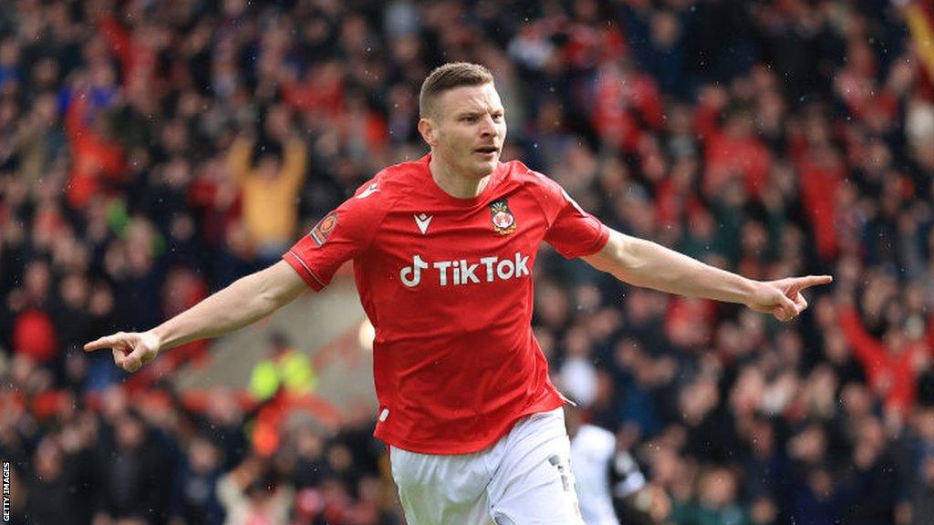 Paul Mullin celebrates a goal for Wrexham