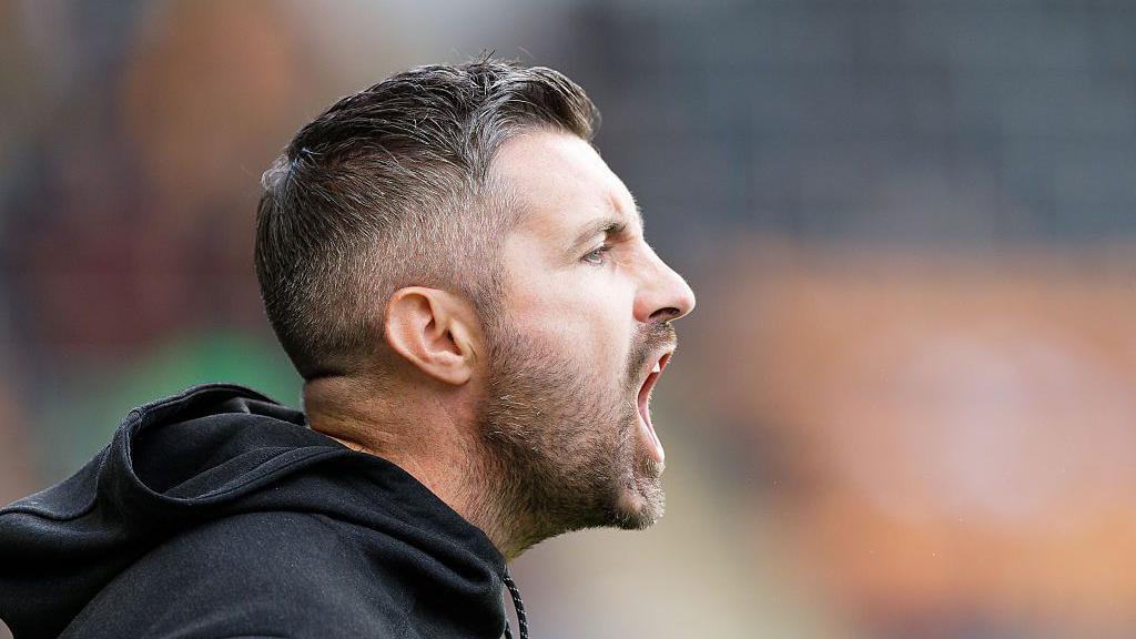 Alan Sheehan shouts at his players from the touchline 