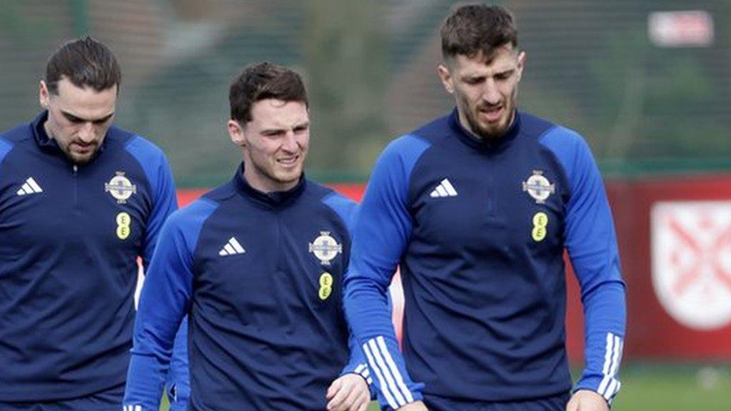 Craig Cathcart leads a group at training