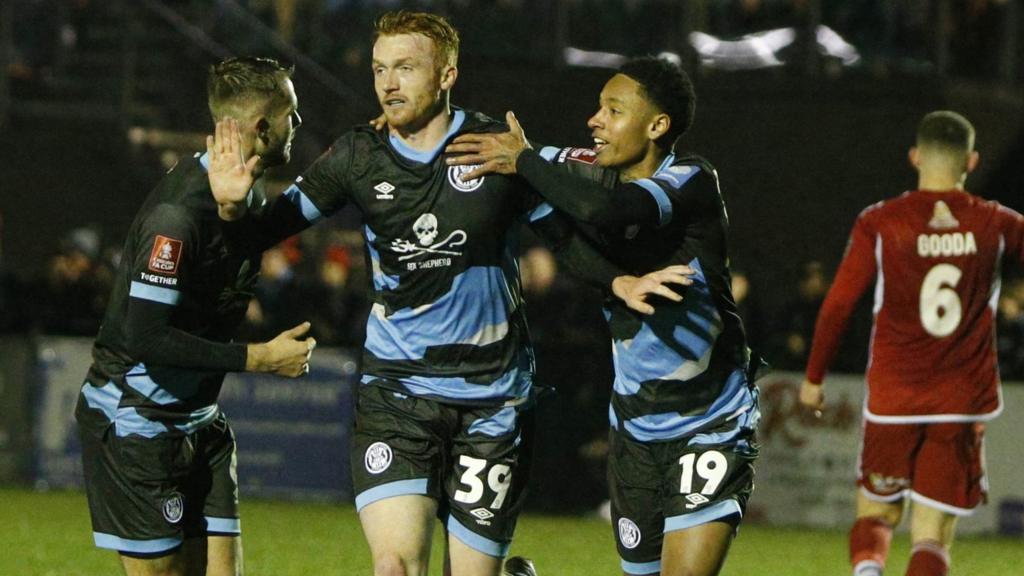 Forest Green Rovers players celebrate their second goal against Scarborough Athletic