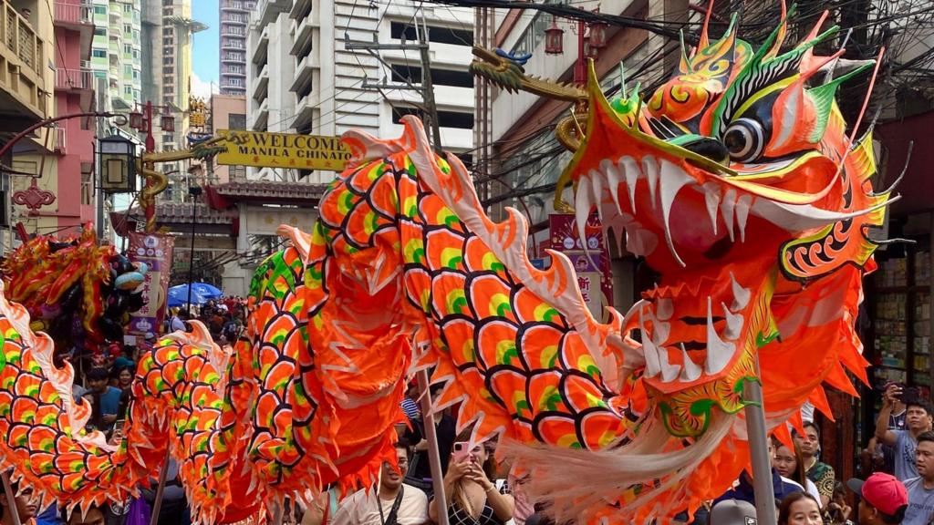 Dancers perform a traditional dance during Lunar New Year celebrations in Manila, Philippines