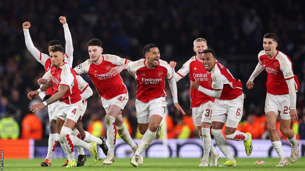 Arsenal players celebrate penalty shooutout win over Porto