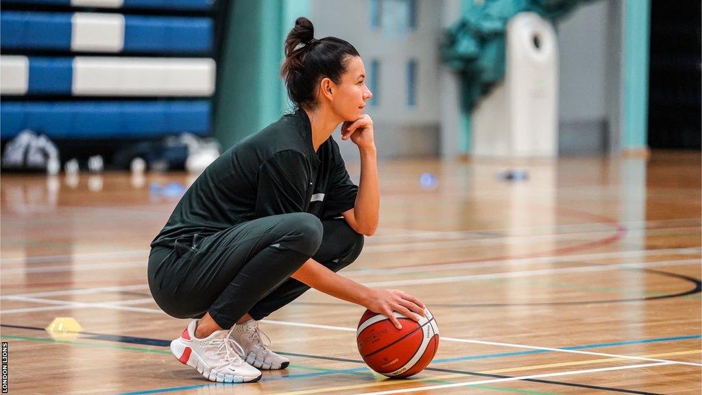 Vanja Cernivec leading down with a basketball