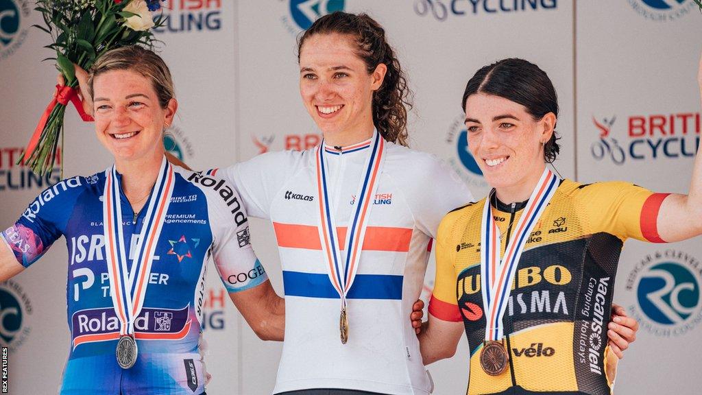 Pfeiffer Georgi (centre) on the podium of the British National Championships alongside Claire Steels (left) and Anna Henderson (right)