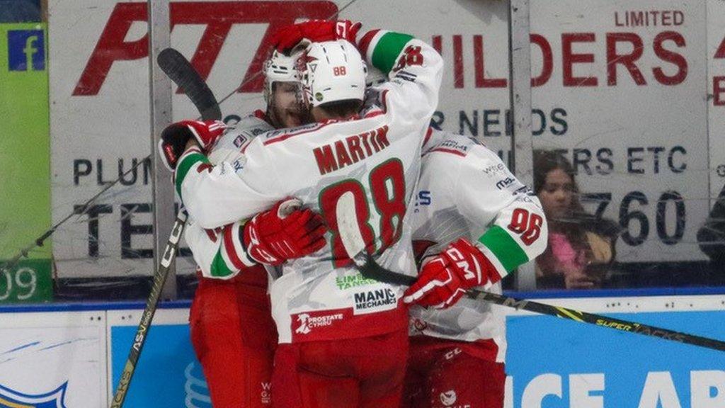 Joey Martin celebrates with his Cardiff Devils team mates