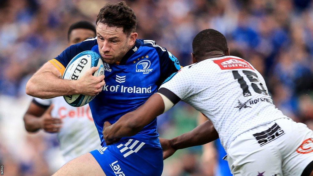 Leinster full-back Hugo Keenan is tackled by Aphelele Fassi at the Aviva Stadium