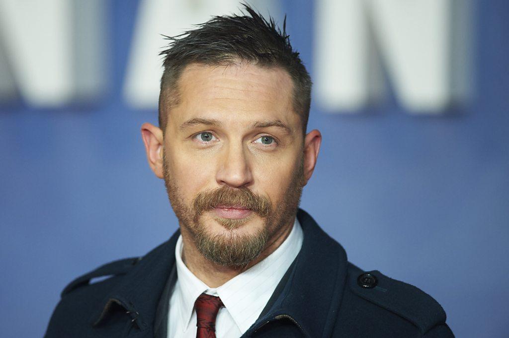 A smartly dressed Tom Hardy