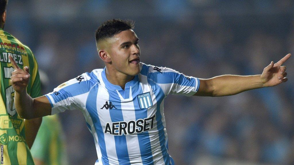 Carlos Alcaraz celebrates scoring a goal for Racing Club