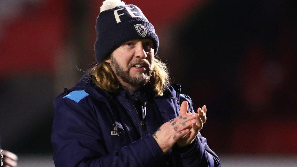 Sean Long applauds after a win as Featherstone Rovers coach