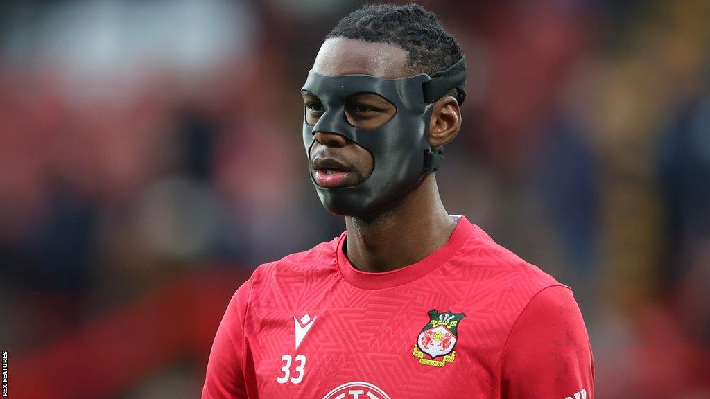 Arthur Okonkwo wears a protective face mask on this occasion