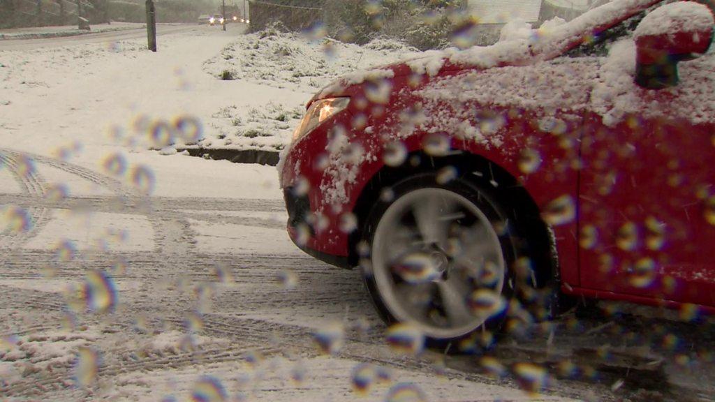 A bar driving in snow