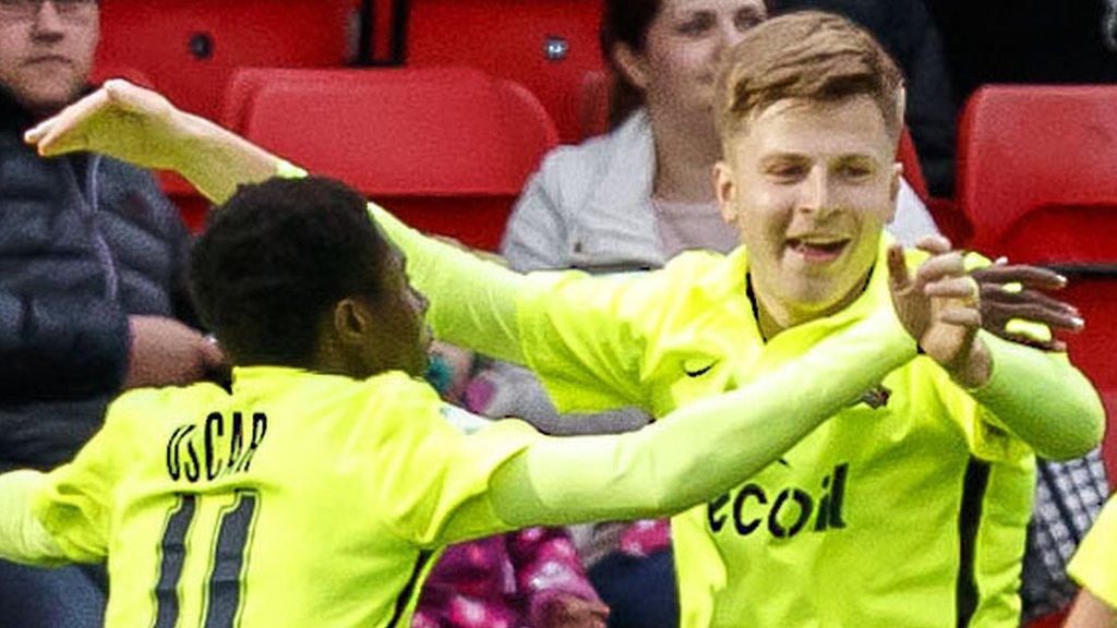 Maksim Maksimov (right) celebrates against St Johnstone