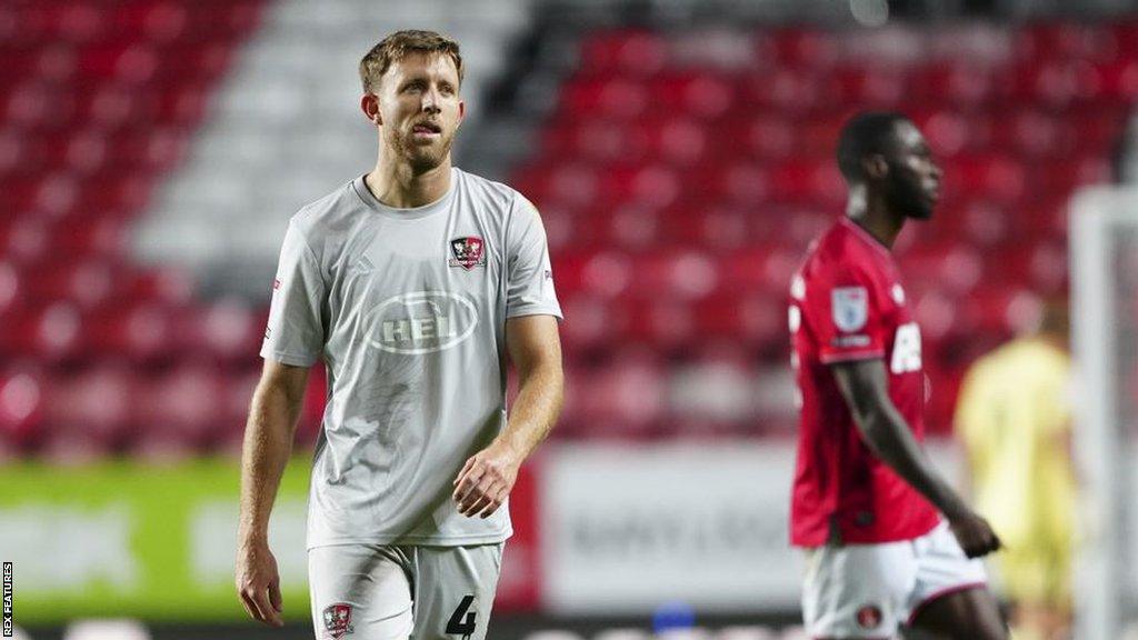 Will Aimson walks off after receiving a red card.