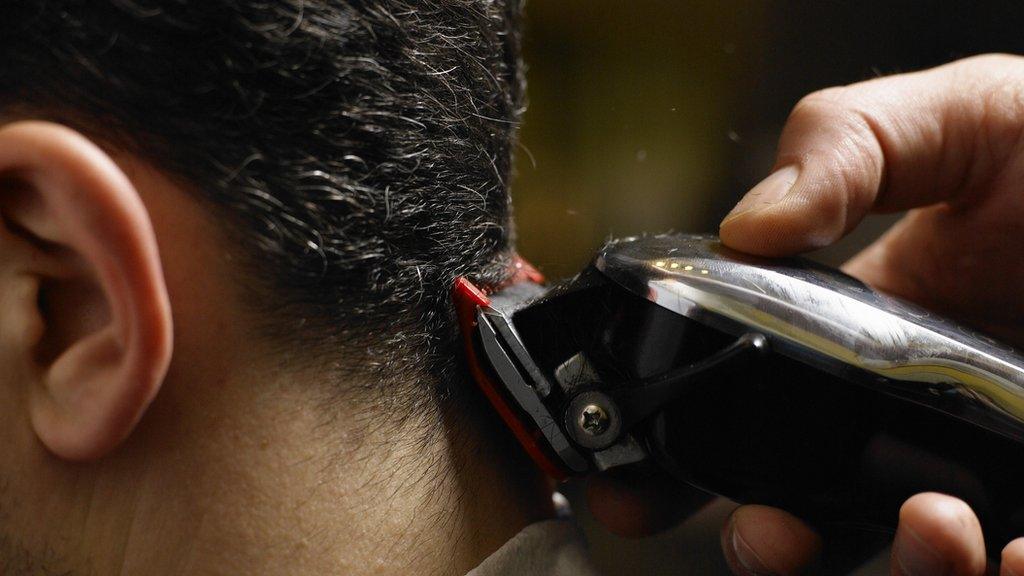 Man having hair cut