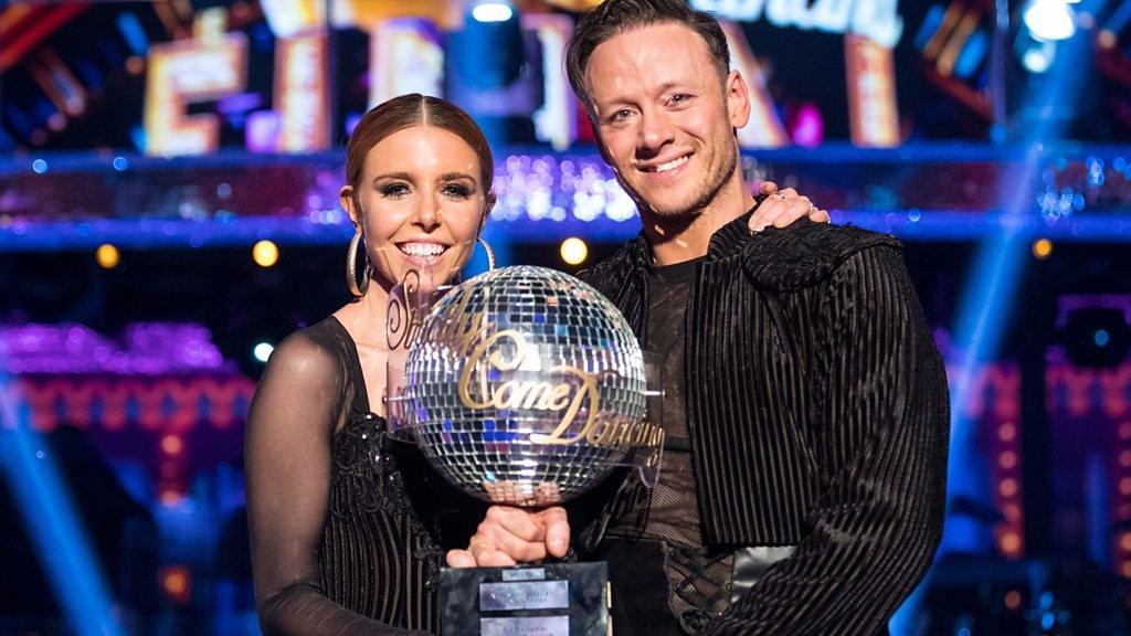 Stacey Dooley and Kevin Clifton with the Strictly Come Dancing Glitterball trophy