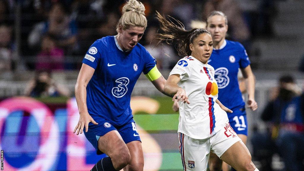 Delphine Cascarino of Olympique Lyon (R) is chased by Millie Bright of Chelsea (L) during the UEFA Women's Champions League quarter-final 1st leg match between Olympique Lyonnais and Chelsea FC at Groupama Stadium