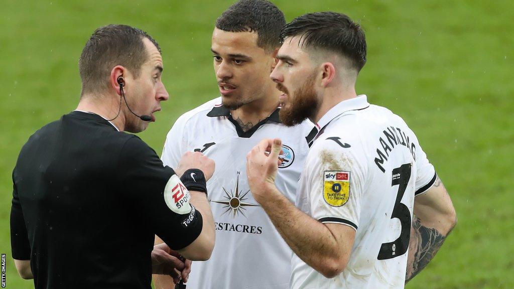 Swansea defenders Joel Latibeaudiere and Ryan Manning