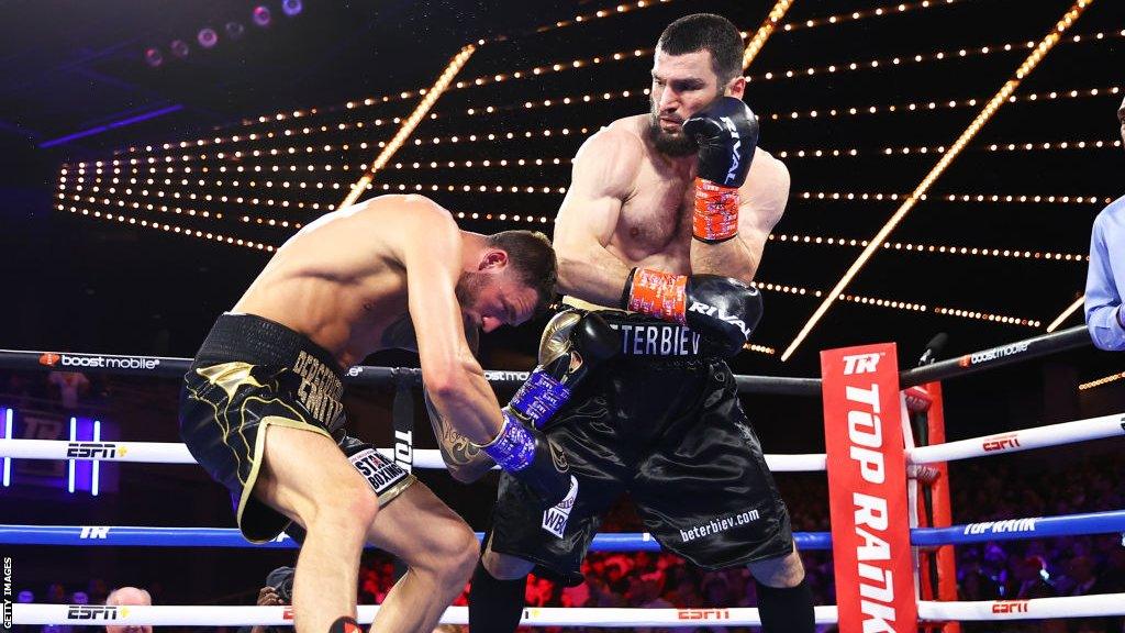 Artur Beterbiev lands a punch on Joe Smith