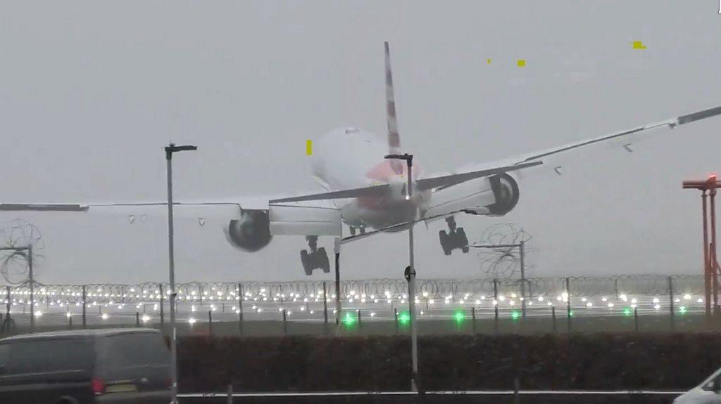 American Airlines plane leaning to one side