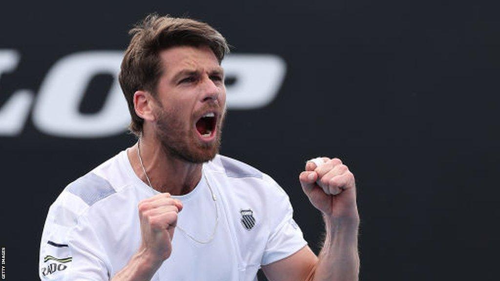 Cameron Norrie celebrates beating Guilio Zeppieri at the Australian Open