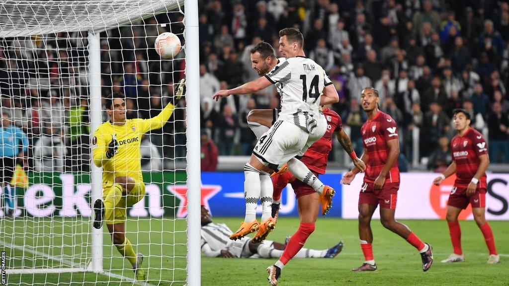 Federico Gatti of Juventus scores during the Uefa Europa League match between Juventus v Sevilla at the Allianz Stadium