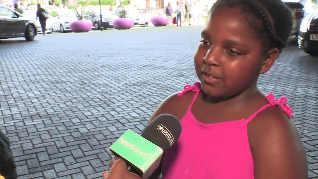 Girl donating food