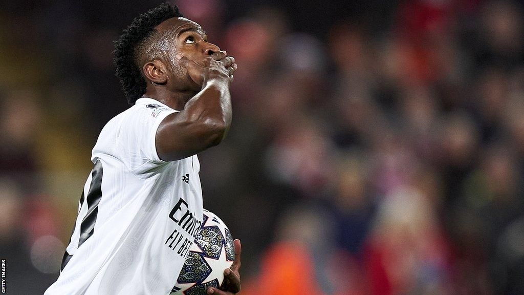 Vinicius Jr celebrates scoring at Anfield