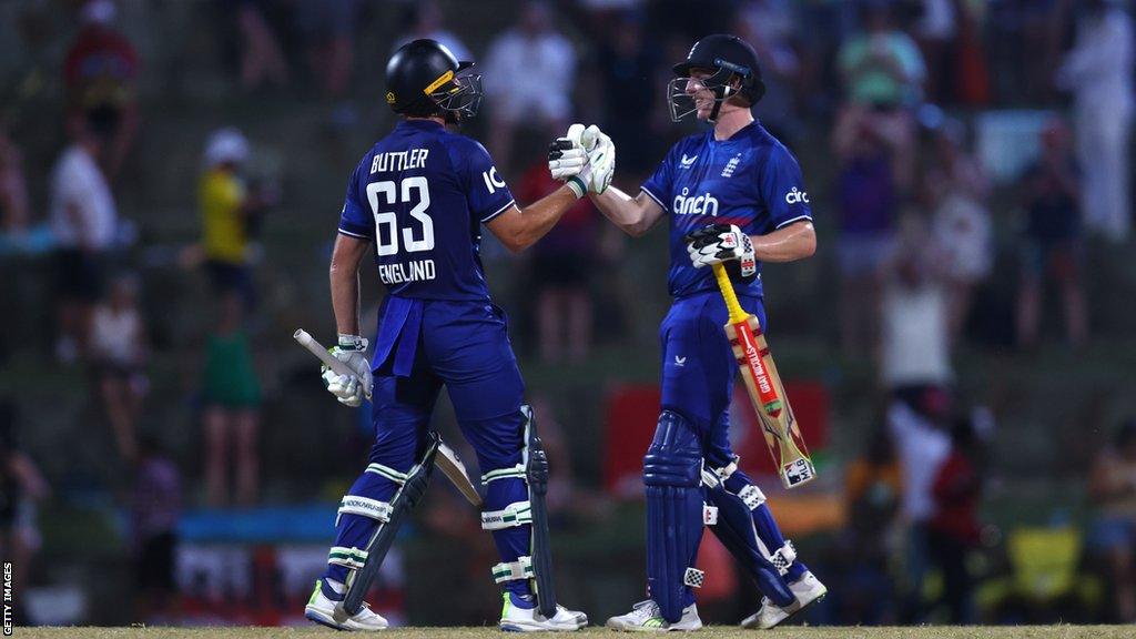 Jos Buttler (left) and Harry Brook (right) celebrate the winning runs against West Indies in the second ODI