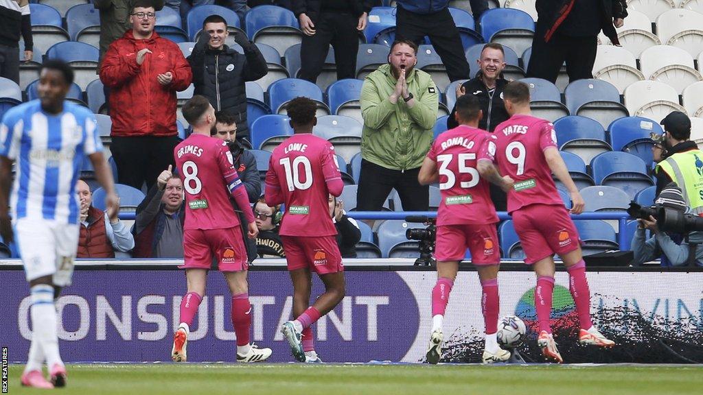 Swansea celebrate Jamal Lowe's goal