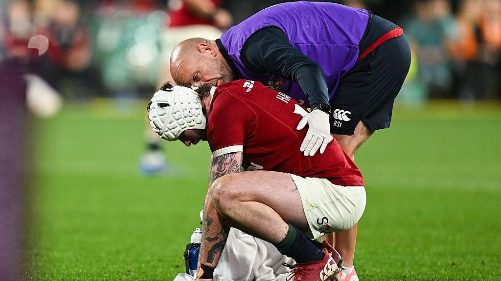 Mack Hansen receives treatment