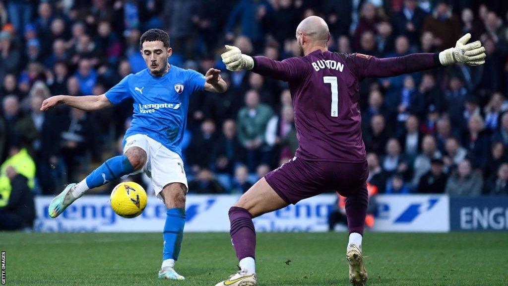 Armando Dobra scores his second goal for Chesterfield against West Bromwich Albion