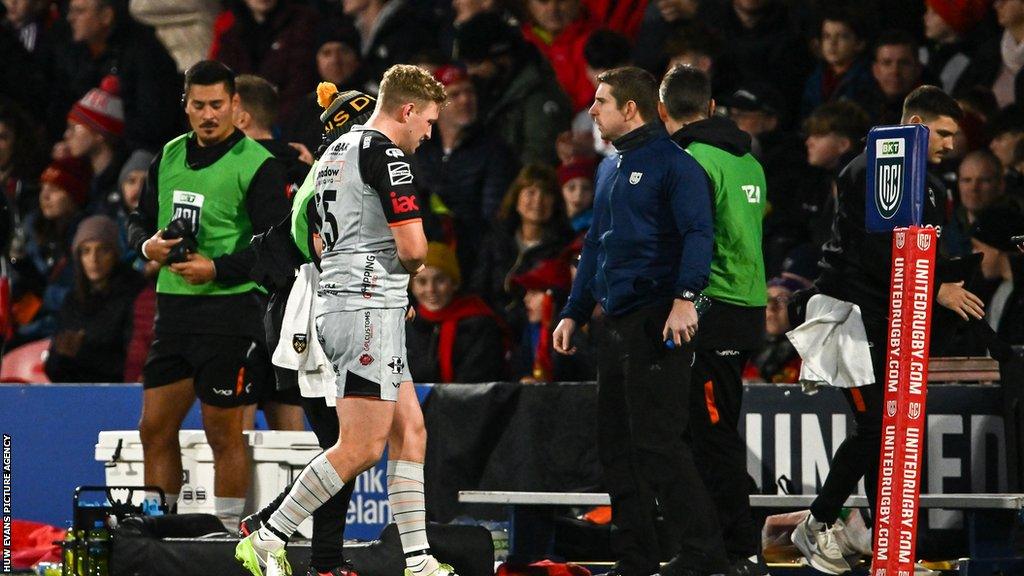 Angus O'Brien helped off against Munster