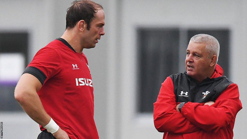 Wales coach Warren Gatland and second row Alun Wyn Jones talk at training