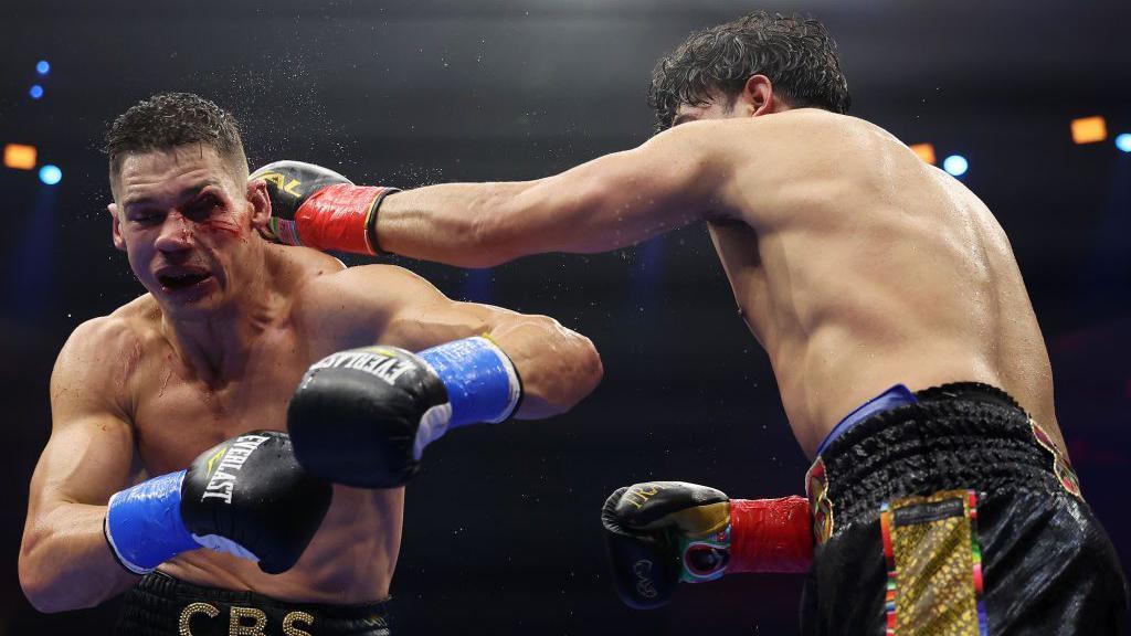 Gilberto Ramirez punches Chris Billam-Smith during their WBO World Cruiserweight title fight on the Riyadh Season Latino Night at Kingdom Arena on November 16, 2024 in Riyadh