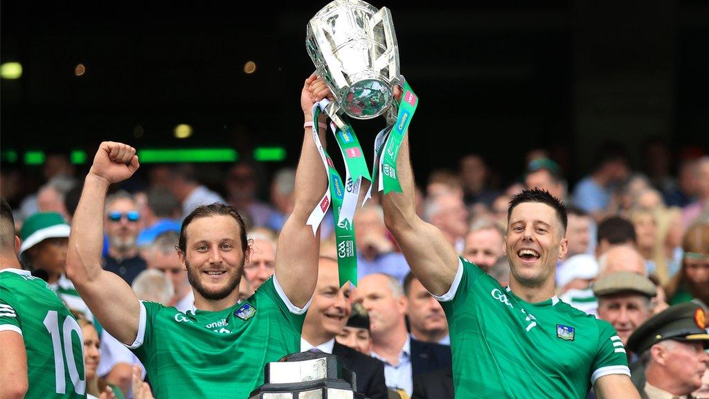 Tom Morrissey and Dan Morrissey with the Liam MacCarthy Cup