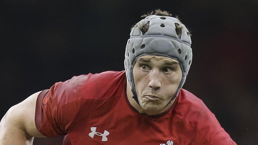 Jonathan Davies looks to make a break for Wales