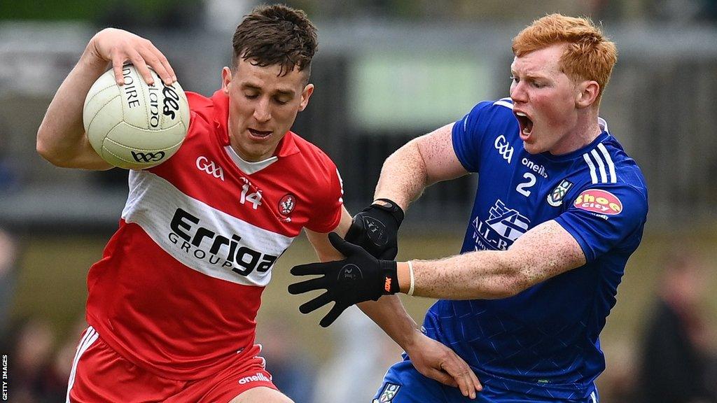 Monaghan's Ryan O'Toole challenges Derry's Shane McGuigan