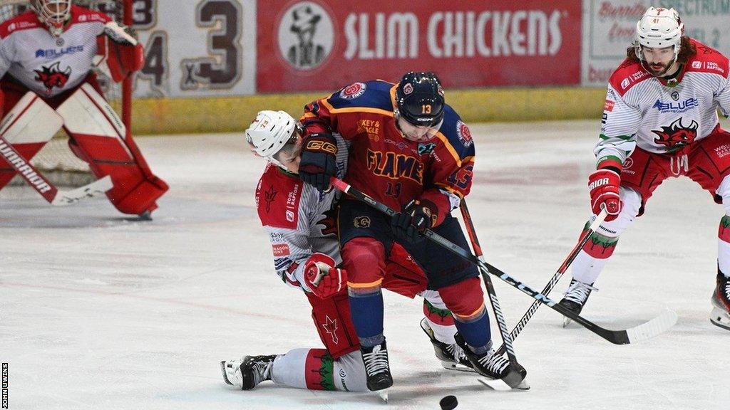 Cardiff Devils and Guildford Flames battle for possession