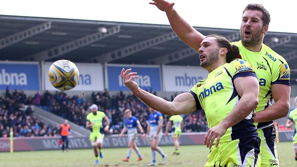 Tom Arscott celebrates his first try