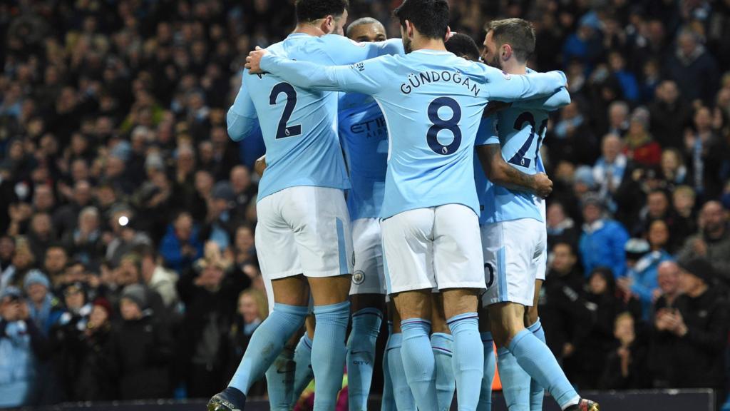 Manchester City players celebrate