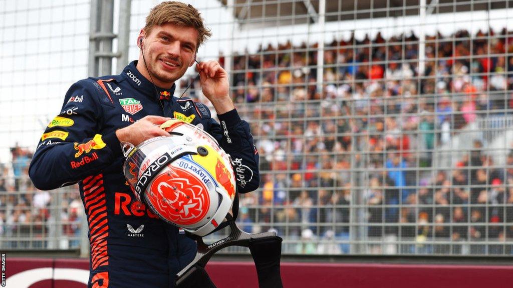 Max Verstappen smiles after a race victory