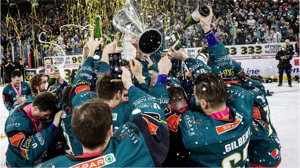 Belfast Giants celebrate with the Elite League trophy