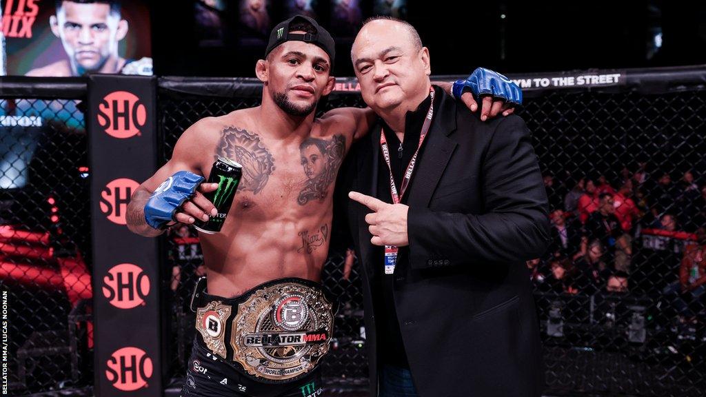 Patchy Mix celebrates winning the undisputed bantamweight title with Bellator president Scott Coker