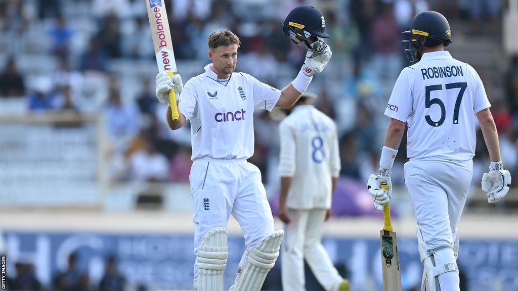 Joe Root celebrates his century v India in Ranchi