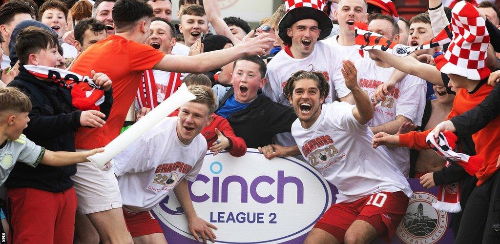 Stirling Albion players celebrate promotion from League Two