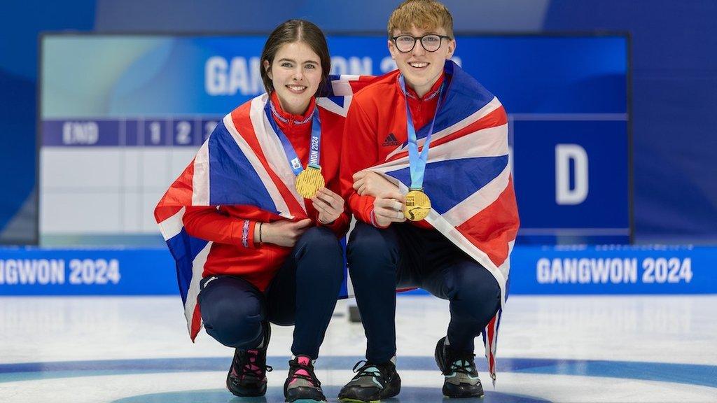 Callie Soutar and Ethan Brewster with their gold medal